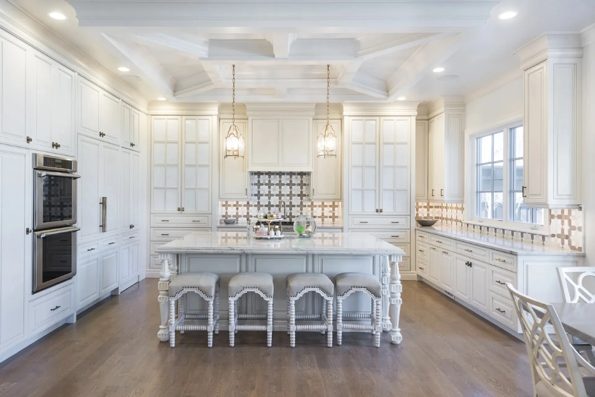 Classic white custom kitchen by Millcreek Cabinet and Design
