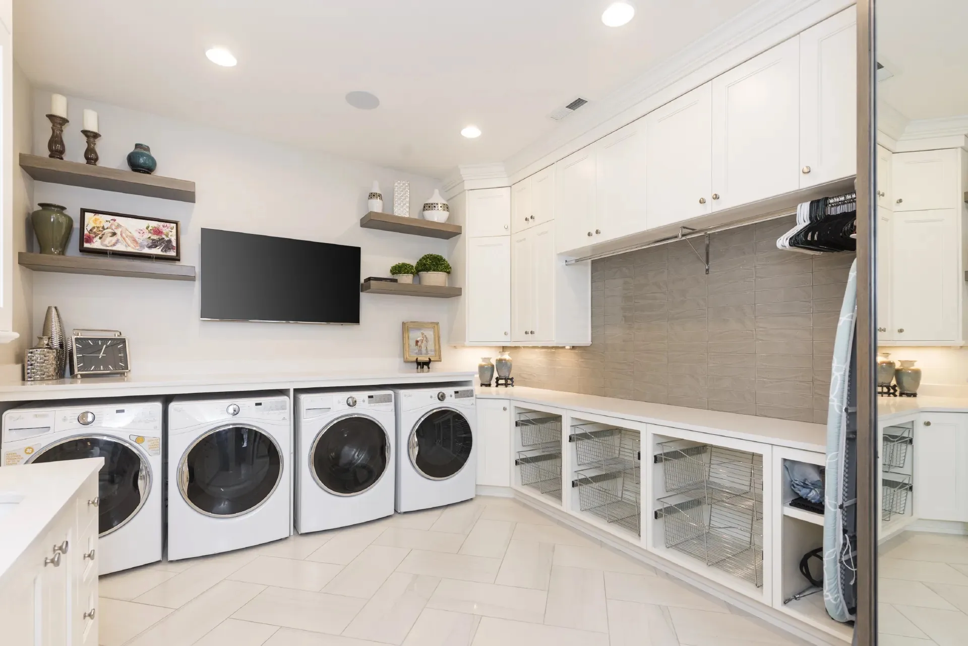 Custom laundry room cabinetry by Millcreek Cabinet and Design